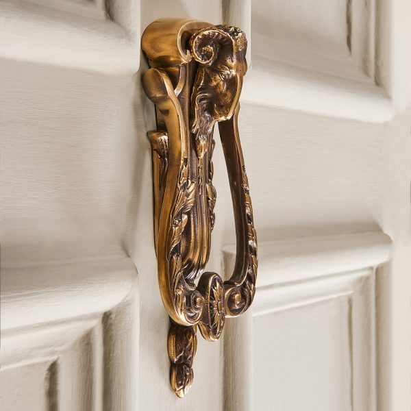 rams head door knocker aged brass