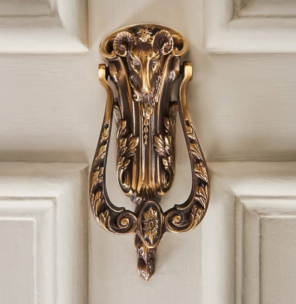 rams head door knocker aged brass