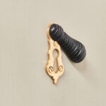 beehive lady escutcheon ebonised wood
