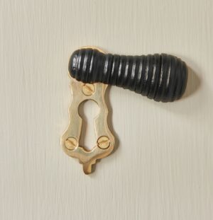 beehive lady escutcheon ebonised wood