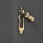 lady escutcheon aged brass