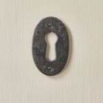 oval forged escutcheon black waxed