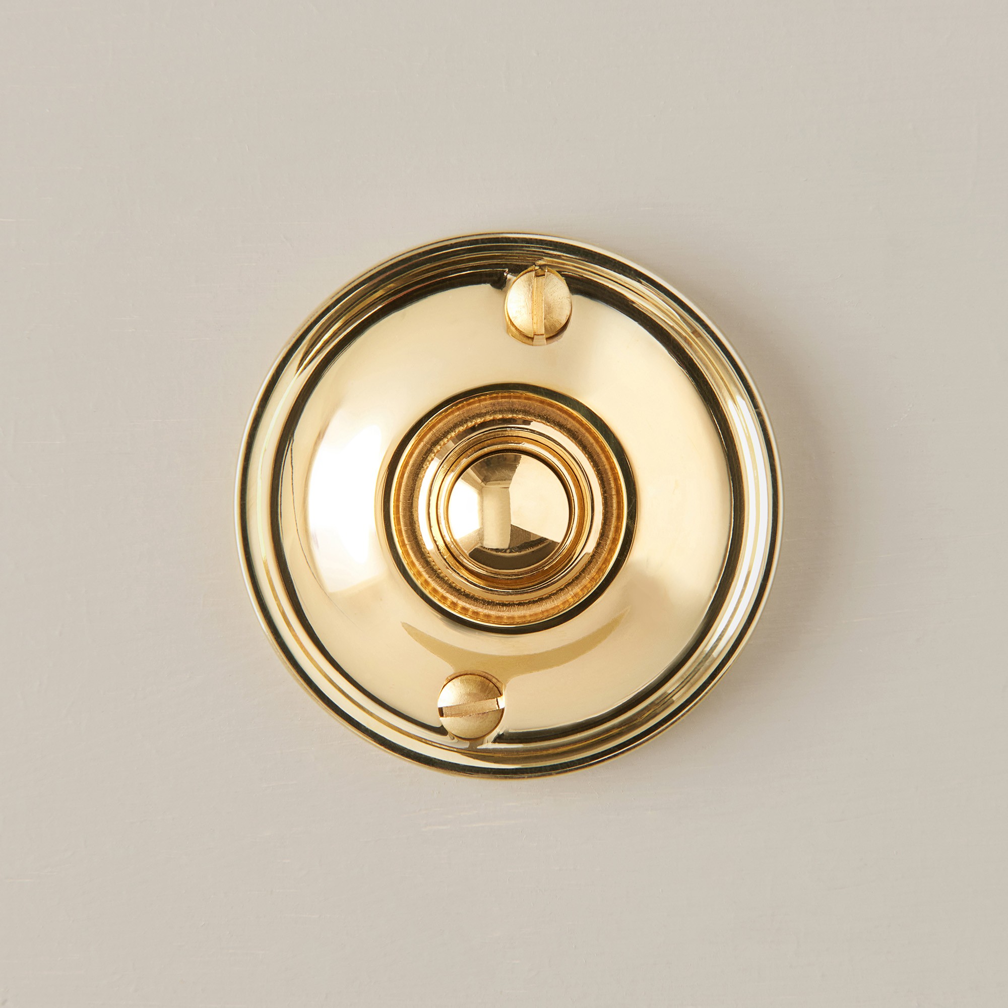 round bell push polished brass