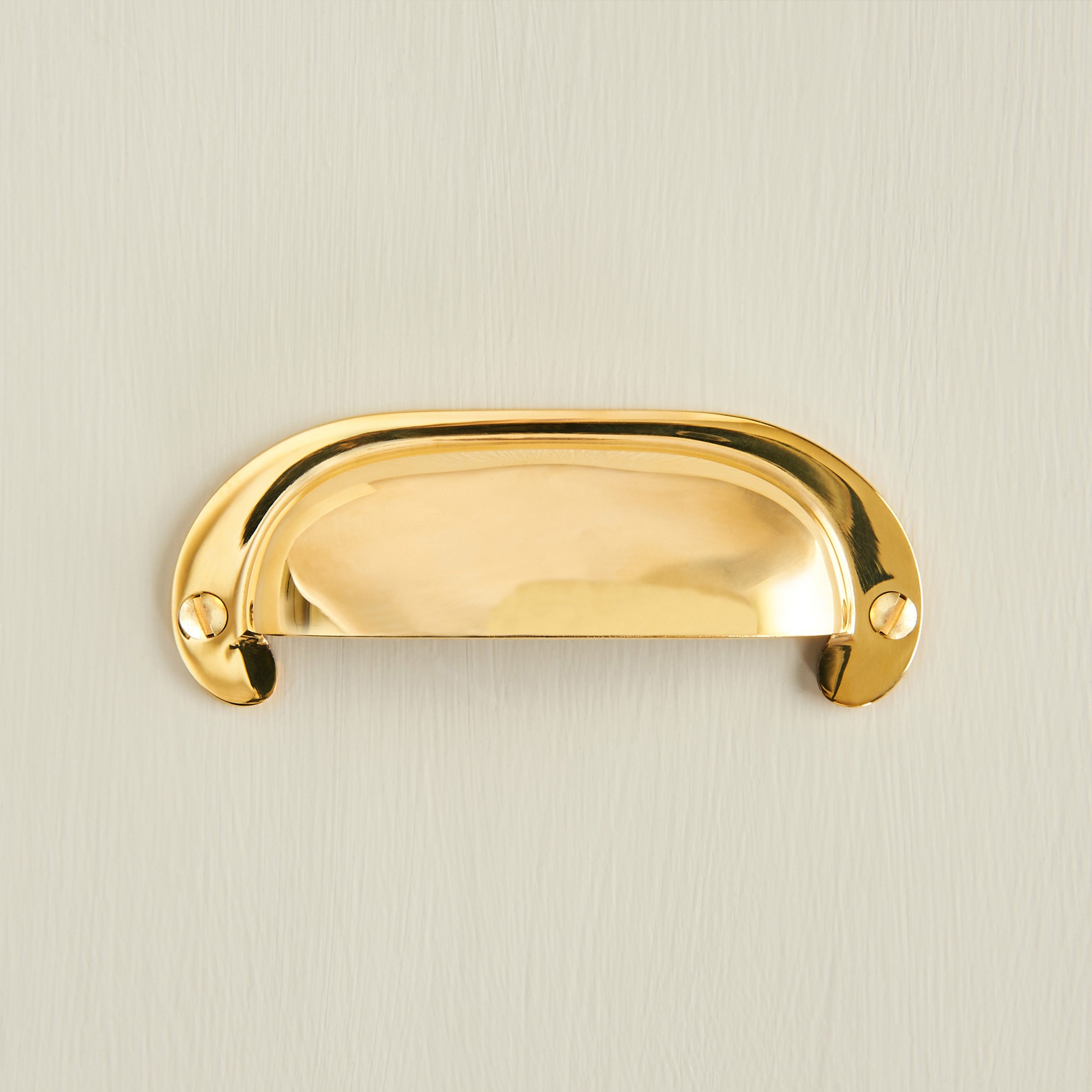 curved hooded drawer pull brass