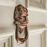 large lions head door knocker autumn bronze