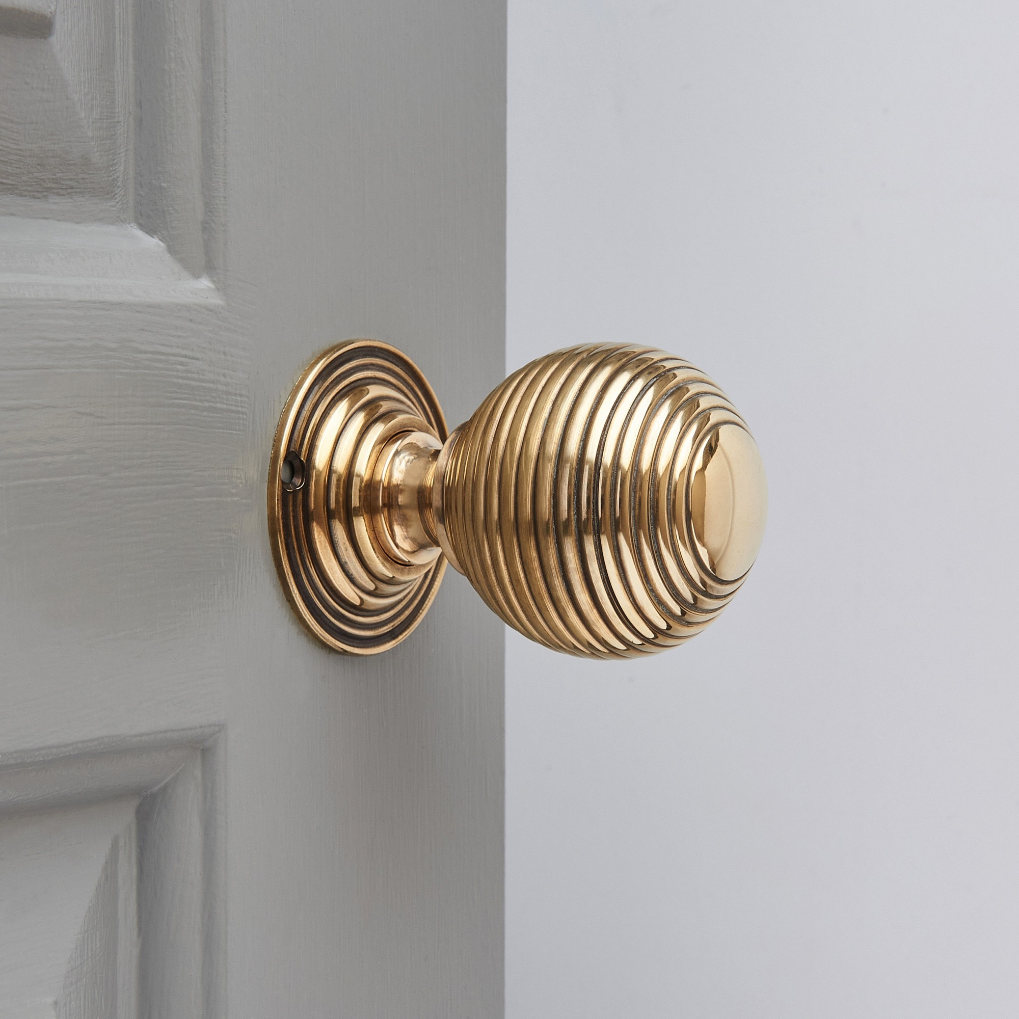 Large Beehive Aged Brass Door Knobs