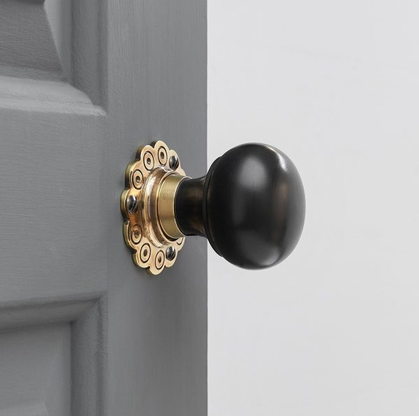 Ebony Bun Door Knobs (Pair) - Aged Brass Collar & Rose