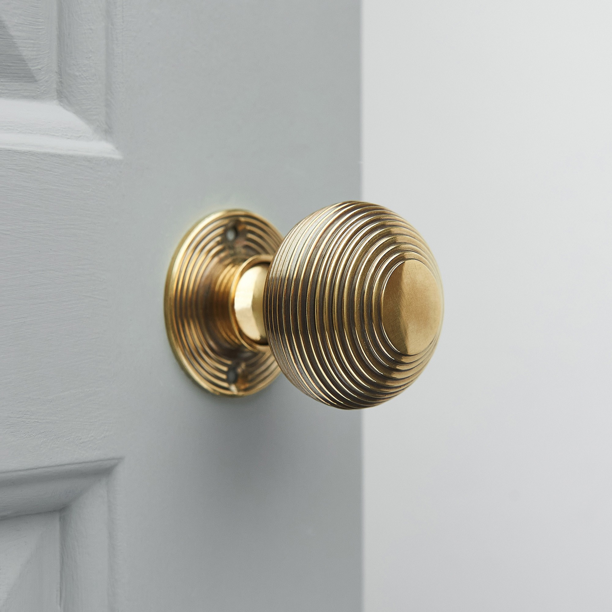 Small Beehive Door Knobs in Aged Brass or Polished Nickel