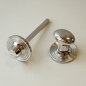 Oval Knob Turn and Release on Reeded Rose - Polished Nickel