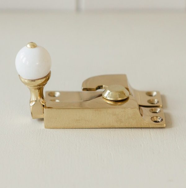 Straight Arm Sash Window Fastener with White Knob - Brass