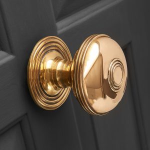 Regency Style Centre Door Pull - Aged Brass