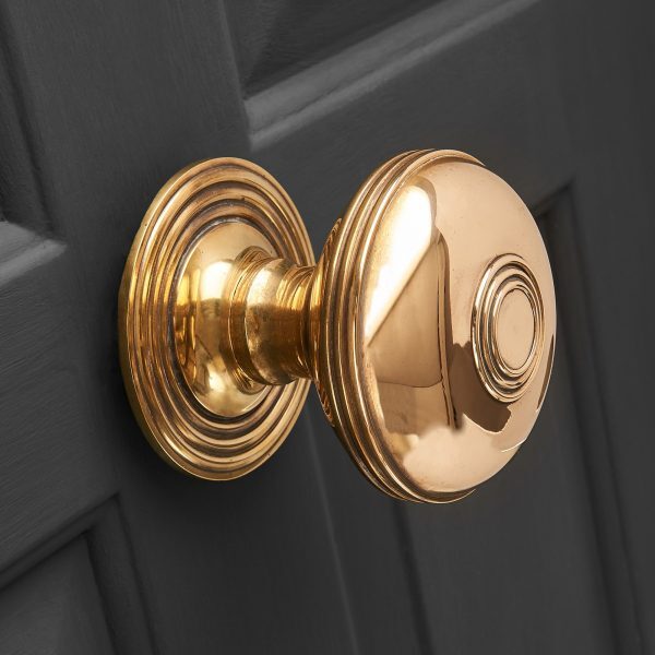Regency Style Centre Door Pull - Aged Brass