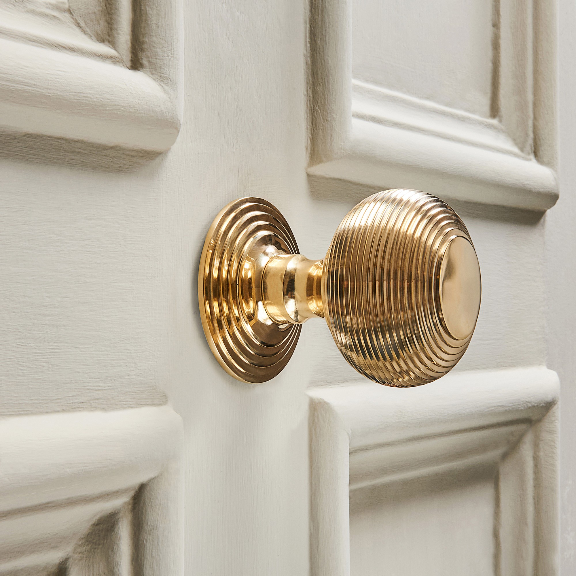 polished brass beehive centre door knob