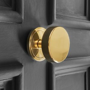 knurled centre door knob polished brass