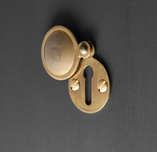 covered escutcheon aged brass