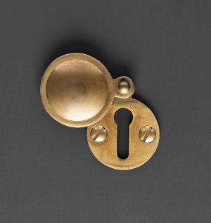 covered escutcheon aged brass