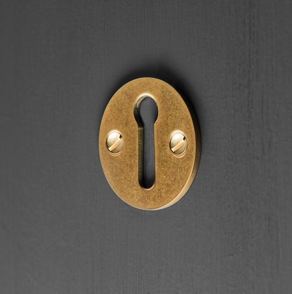 open escutcheon aged brass