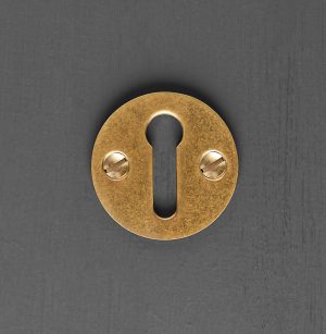 open escutcheon aged brass