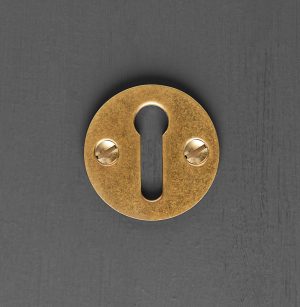 open escutcheon aged brass