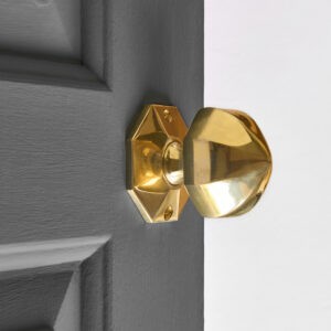 curved octagonal door knobs (pair) polished brass