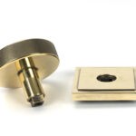 aged brass brompton centre door knob (square)