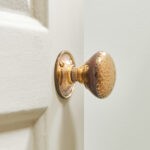 hammered cottage door knobs (pair) aged brass