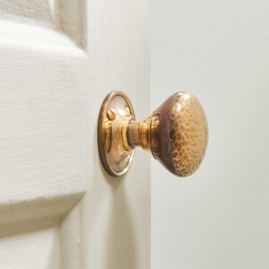 hammered cottage door knobs (pair) aged brass