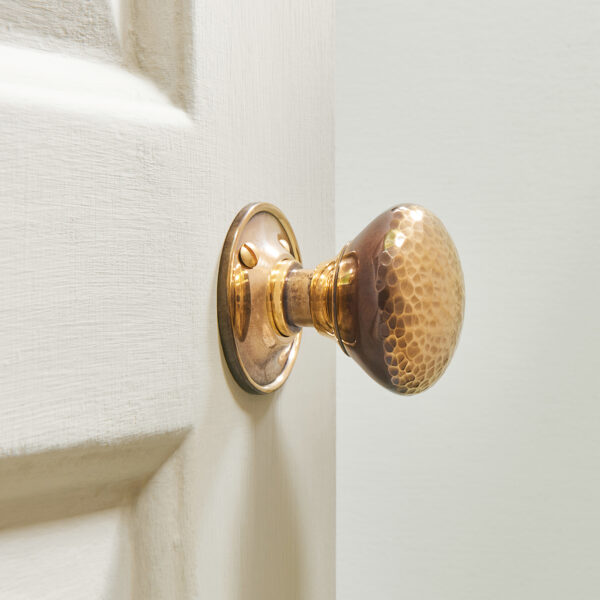 hammered cottage door knobs (pair) aged brass