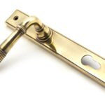 aged brass reeded slimline lever espag. lock set