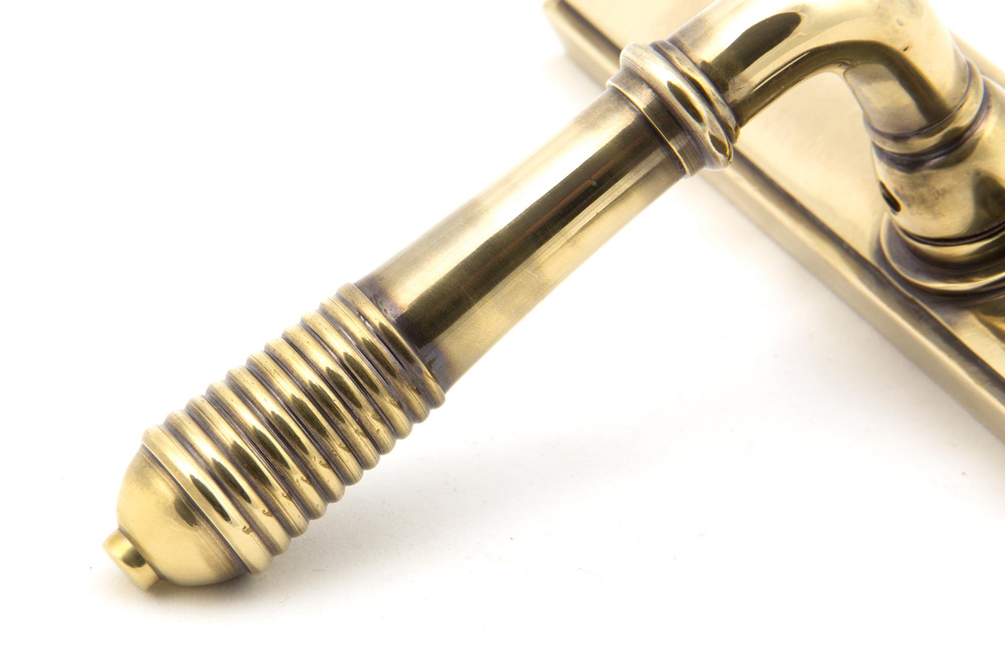 aged brass reeded slimline lever espag. lock set