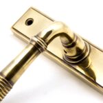 aged brass reeded slimline lever latch set