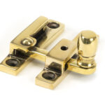 aged brass mushroom quadrant fastener narrow