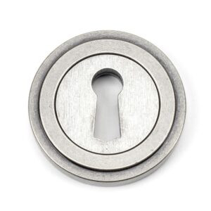 pewter round escutcheon (art deco)