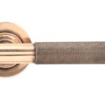 polished bronze brompton lever on rose set (plain)