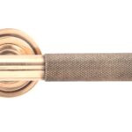 polished bronze brompton lever on rose set (art deco)