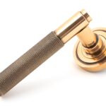 polished bronze brompton lever on rose set (art deco)