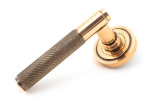 polished bronze brompton lever on rose set (art deco)