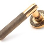 polished bronze brompton lever on rose set (beehive)