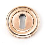polished bronze round escutcheon (art deco)