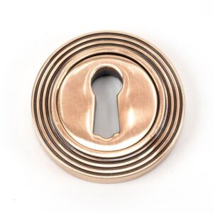 polished bronze round escutcheon (beehive)
