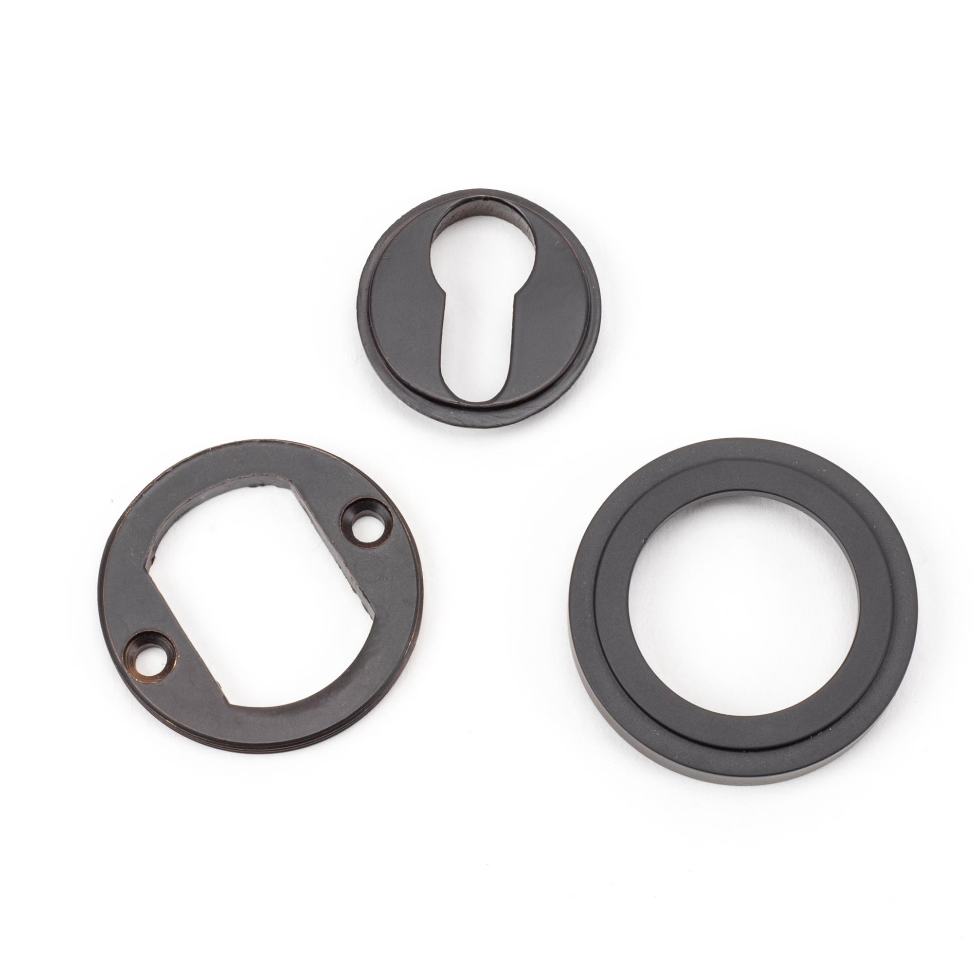 aged bronze round euro escutcheon (art deco)