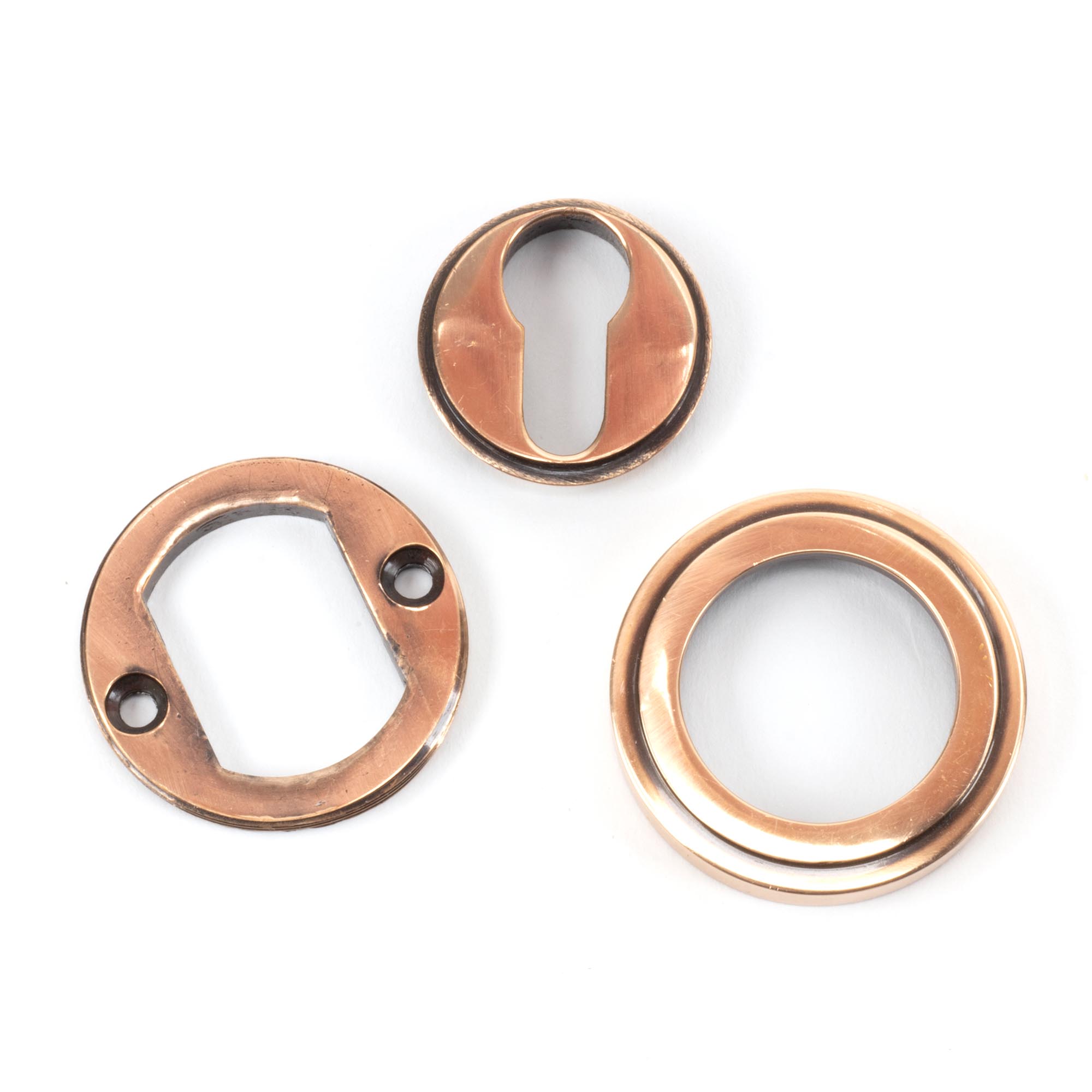 polished bronze round euro escutcheon (art deco)