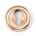 polished bronze round euro escutcheon (art deco)