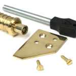 polished brass key flush sash stop