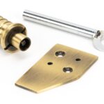 aged brass key flush sash stop