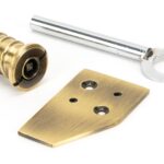 aged brass key flush sash stop