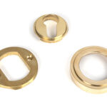 polished brass round euro escutcheon (art deco)