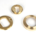 polished brass round euro escutcheon (beehive)
