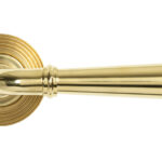 polished brass newbury lever on rose set (beehive)