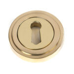 polished brass round escutcheon (art deco)